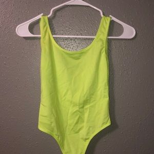 Neon green body suit